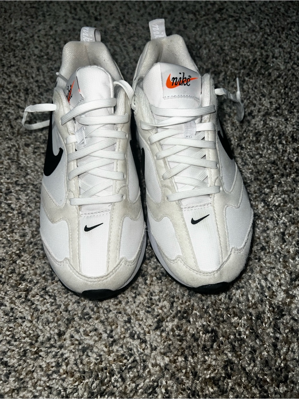 Nike White Athletic Sneakers with Black Swoosh and Orange Logo